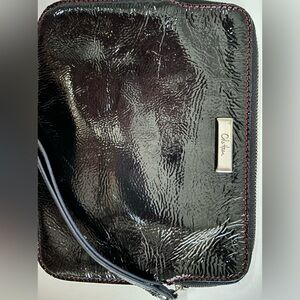 Cole Haan wristlet patent leather